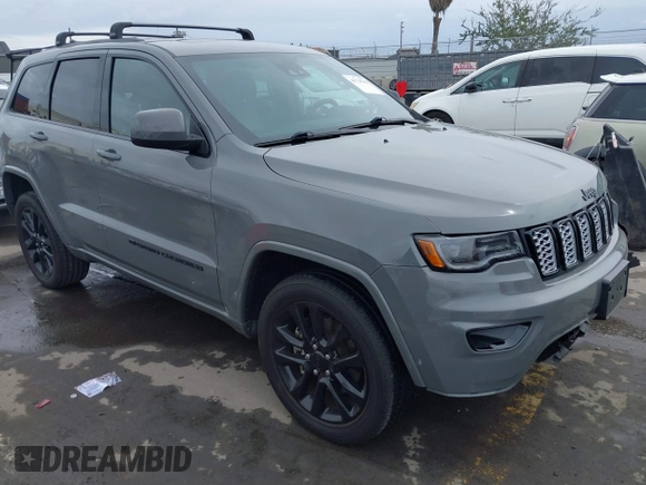 2022 Jeep Grand Cherokee WK Laredo E with VIN 1C4RJFAG4NC143834, listed as a IAAI auction lot 41778743 with 33,018 mi miles. Bid and sale history available at carsss.com. Image 1.