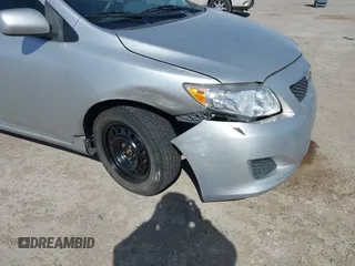 2010 Toyota Corolla with VIN JTDBU4EE1AJ069302, listed as a IAAI auction lot 41854288 with 196,844 mi miles. Bid and sale history available at carsss.com. Image 6.