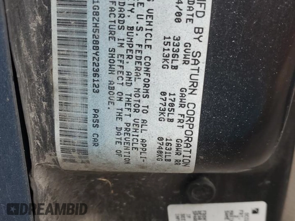 2000 Saturn SL with VIN 1G8ZK5276YZ238736, listed as a Copart auction lot 80936244 with 94,560 mi miles and Salvage title. Bid and sale history available at DreamBid. Image 12.