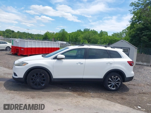 2014 Mazda CX-9 Grand Touring z VIN JM3TB3DV0E0436649, wystawiony jako IAAI lot #42319638 z przebiegiem 128 421 mil mil oraz . Historia ofert i sprzedaży dostępna na DreamBid. Obrazek 14.