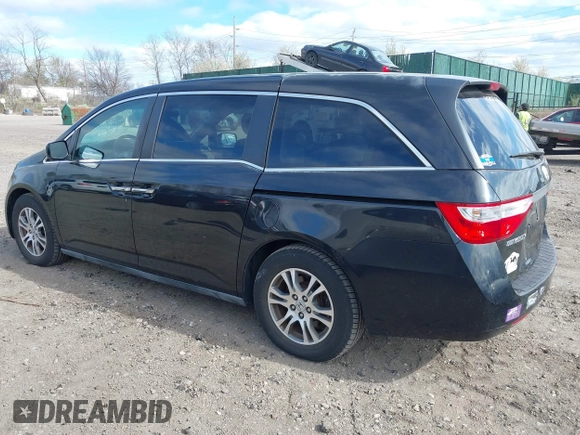 2011 Honda Odyssey EX with VIN 5FNRL5H4XBB011918, listed as a IAAI auction lot 42056043 with 201,821 mi miles and . Bid and sale history available at carsss.com. Image 3.
