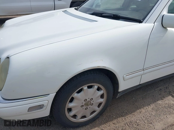 1998 Mercedes-Benz E-Class with VIN WDBJF65FXWA615255, listed as a IAAI auction lot 42146962 with 219,710 mi miles. Bid and sale history available at carsss.com. Image 6.