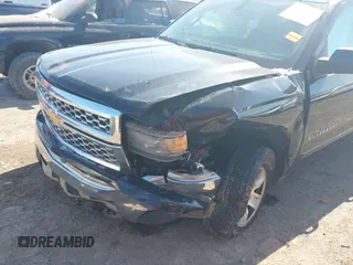 2015 Chevrolet Silverado 1500 LT with VIN 1GCRCREH3FZ206158, listed as a IAAI auction lot 41610695 with 182,692 mi miles. Bid and sale history available at carsss.com. Image 6.