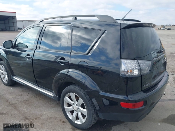 2010 Mitsubishi Outlander XLS with VIN JA4JT4AX6AZ002549, listed as a IAAI auction lot 41669290 with 136,757 mi miles. Bid and sale history available at carsss.com. Image 3.