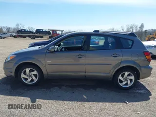 2005 Pontiac Vibe with VIN 5Y2SL63865Z427576, listed as a IAAI auction lot 42051342 with 159,708 mi miles. Bid and sale history available at carsss.com. Image 14.