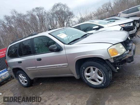 2005 GMC Envoy SLE with VIN 1GKDT13S552332088, listed as a IAAI auction lot 41699178 with 196,869 mi miles. Bid and sale history available at carsss.com. Image 14.