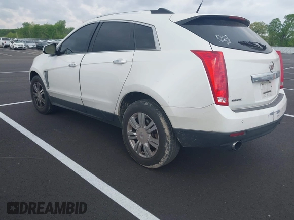 2014 Cadillac SRX Luxury Collection with VIN 3GYFNBE36ES519705, listed as a IAAI auction lot 42069288 with 211,632 mi miles and . Bid and sale history available at carsss.com. Image 3.