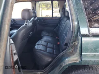 1998 Jeep Grand Cherokee Limited with VIN 1J4GZ78Y8WC261353, listed as a Copart auction lot 76605944 with 156,883 mi miles and Salvage Title. Bid and sale history available at carsss.com. Image 10.