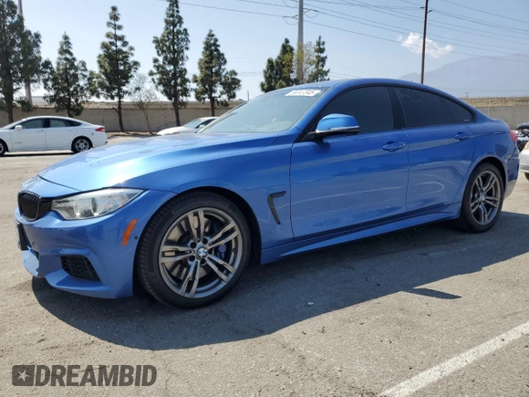 2015 BMW 4 Series 435i with VIN WBA4B1C59FD955421, listed as a Copart auction lot 56347345 with 42,922 mi miles and Salvage title. Bid and sale history available at DreamBid. Image 1.