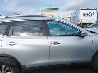 2016 Nissan Rogue SV with VIN 5N1AT2MV7GC801364, listed as a IAAI auction lot 41111105 with 145,268 mi miles and . Bid and sale history available at carsss.com. Image 14.