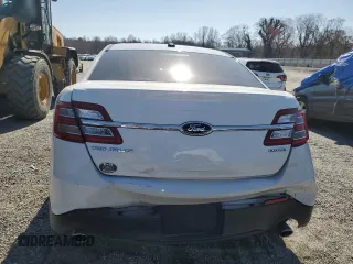 2014 Ford Taurus SE with VIN 1FAHP2D8XEG112805, listed as a Copart auction lot 48975265 with 127,730 mi miles and Salvage Title. Bid and sale history available at DreamBid. Image 6.