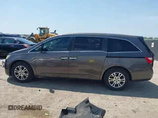 2012 Honda Odyssey EX with VIN 5FNRL5H41CB011940, listed as a IAAI auction lot 42033966 with 182,996 mi miles and . Bid and sale history available at DreamBid. Image 14.