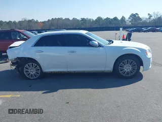 2013 Chrysler 300 Luxury Series with VIN 2C3CCASGXDH573689, listed as a IAAI auction lot 41782712 with 204,746 mi miles and . Bid and sale history available at DreamBid. Image 14.