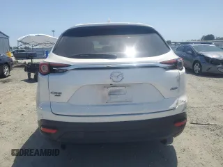 2019 Mazda CX-9 Touring with VIN JM3TCBCY3K0312986, listed as a Copart auction lot 58742195 with 119,464 mi miles and Salvage title. Bid and sale history available at DreamBid. Image 6.