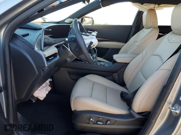 2024 Cadillac XT4 FWD Premium Luxury with VIN 1GYFZCR47RF213944, listed as a Copart auction lot 87674675 with 1,606 mi miles and Salvage title. Bid and sale history available at DreamBid. Image 7.