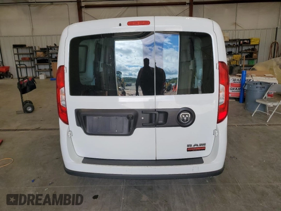2022 Ram ProMaster City Cargo Tradesman with VIN ZFBHRFAB9N6W52697, listed as a Copart auction lot 66958114 with 91,313 mi miles and Salvage Title. Bid and sale history available at DreamBid. Image 6.
