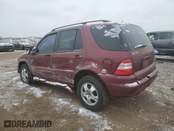 2003 Mercedes-Benz M 320 with VIN 4JGAB54E23A392023, listed as a Copart auction lot 44997015 with 139,835 mi miles and Salvage title. Bid and sale history available at DreamBid. Image 2.