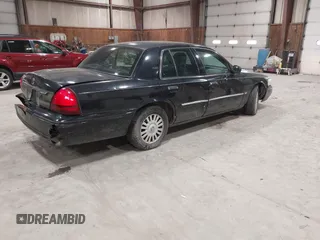 2008 Mercury Grand Marquis LS z VIN 2MEFM75V18X617284, wystawiony jako IAAI lot #41948364 z przebiegiem 106 294 mil mil oraz . Historia ofert i sprzedaży dostępna na DreamBid. Obrazek 4.