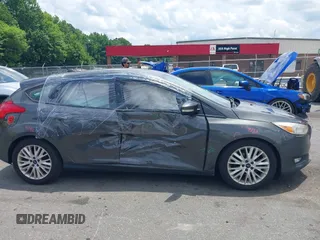 2016 Ford Focus Titanium with VIN 1FADP3N20GL275763, listed as a IAAI auction lot 42511959 with 124,891 mi miles and . Bid and sale history available at DreamBid. Image 13.