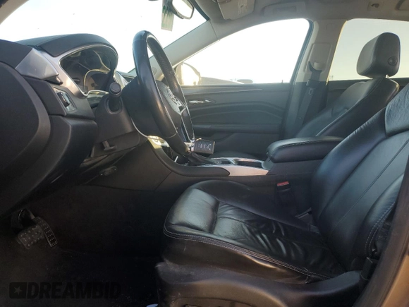 2014 Cadillac SRX z VIN 3GYFNAE34ES561414, wystawiony jako Copart lot #44760395 z przebiegiem 131 723 mil mil oraz Szkoda całkowita • Salvage title. Historia ofert i sprzedaży dostępna na DreamBid. Obrazek 7.