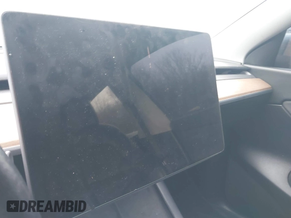 2022 Tesla Model Y Long Range z VIN 7SAYGDEE9NF331410, wystawiony jako IAAI lot #41580172 z przebiegiem 81 794 mil mil oraz . Historia ofert i sprzedaży dostępna na DreamBid. Obrazek 7.
