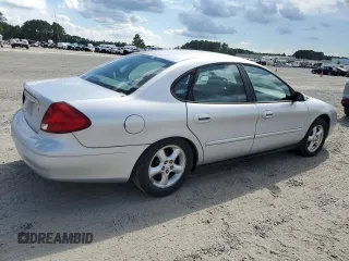 2003 Ford Taurus SE с VIN 1FAHP53233G244946, выставлен на аукционе Copart как лот 61238665 с пробегом 62 315 миль миль и Чистый • Clean title. История ставок и продаж доступна на DreamBid. Изображение 3.