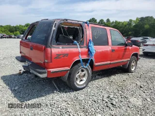 1999 GMC Yukon with VIN 1GKEK13R5XJ700234, listed as a Copart auction lot 55885584 with 163,129 mi miles and Salvage Title. Bid and sale history available at carsss.com. Image 3.