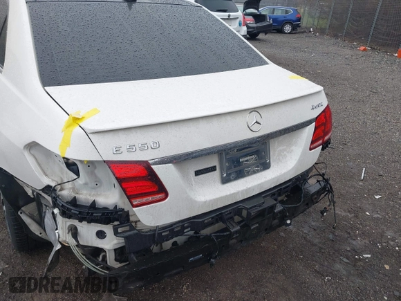 2014 Mercedes-Benz E 550 Sport with VIN WDDHF9BBXEA940995, listed as a IAAI auction lot 41872452 with 50,451 mi miles and . Bid and sale history available at DreamBid. Image 6.
