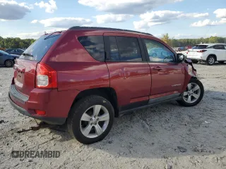 2011 Jeep Compass with VIN 1J4NT1FB4BD194839, listed as a Copart auction lot 73001014 with 113,050 mi miles and Salvage Title. Bid and sale history available at carsss.com. Image 3.