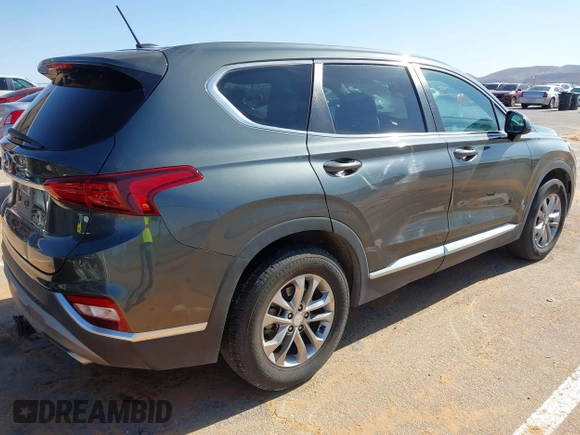 2019 Hyundai Santa Fe SE with VIN 5NMS23AD2KH134016, listed as a IAAI auction lot 41977240 with 61,448 mi miles and . Bid and sale history available at DreamBid. Image 4.