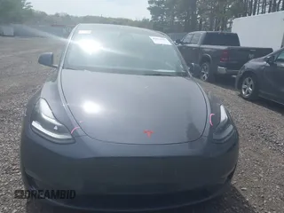 2022 Tesla Model Y Performance with VIN 7SAYGDEF3NF324705, listed as a IAAI auction lot 42076565 with 66,573 mi miles and . Bid and sale history available at carsss.com. Image 12.