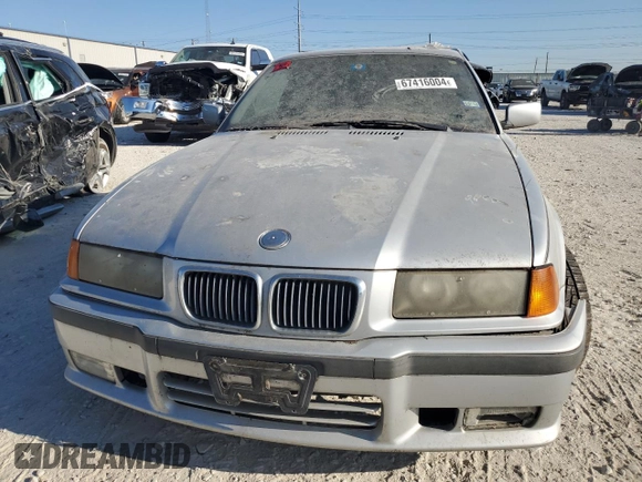 1999 BMW 3 Series 328is with VIN WBABG1338XET08298, listed as a Copart auction lot 67416004 with 0 mi miles and Clean Title. Bid and sale history available at carsss.com. Image 5.