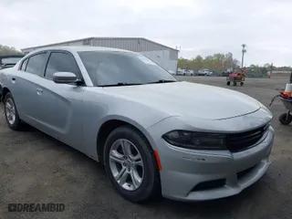 2021 Dodge Charger SXT with VIN 2C3CDXBGXMH515047, listed as a IAAI auction lot 41911801 with 96,657 mi miles. Bid and sale history available at carsss.com. Image 1.