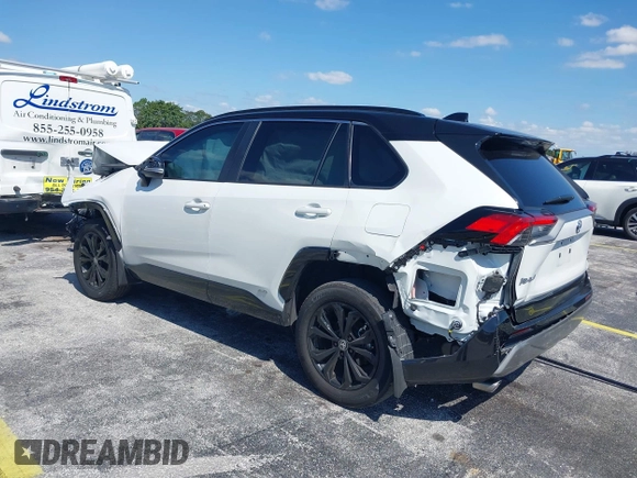 2024 Toyota RAV4 Hybrid XSE with VIN 2T3E6RFV9RW077941, listed as a IAAI auction lot 42012134 with 31,009 mi miles and . Bid and sale history available at DreamBid. Image 3.