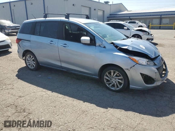 2012 Mazda 5 Sport with VIN JM1CW2BL2C0143227, listed as a Copart auction lot 71596794 with 231,473 mi miles and Salvage Title. Bid and sale history available at DreamBid. Image 4.