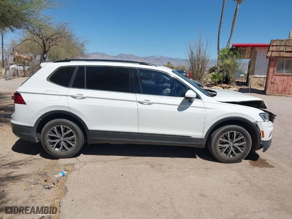 2019 Volkswagen Tiguan SE with VIN 3VV2B7AX1KM092616, listed as a IAAI auction lot 41868660 with 147,419 mi miles. Bid and sale history available at carsss.com. Image 13.