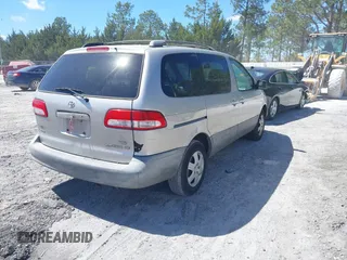 2002 Toyota Sienna CE with VIN 4T3ZF19C92U435896, listed as a IAAI auction lot 41822799 with 201,238 mi miles. Bid and sale history available at carsss.com. Image 4.