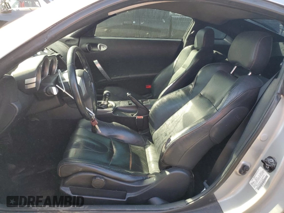 2003 Nissan 350Z Touring z VIN JN1AZ34E73T016672, wystawiony jako Copart lot #52968375 z przebiegiem 125 844 mil mil oraz Szkoda całkowita • Salvage title. Historia ofert i sprzedaży dostępna na DreamBid. Obrazek 7.