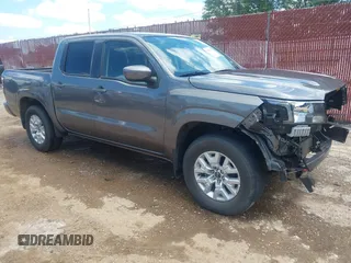 2022 Nissan Frontier SV z VIN 1N6ED1EJ5NN643095, wystawiony jako IAAI lot #42353506 z przebiegiem 50 438 mil mil oraz . Historia ofert i sprzedaży dostępna na DreamBid. Obrazek 1.