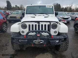 2015 Jeep Wrangler Unlimited Rubicon Hard Rock with VIN 1C4HJWFG8FL647910, listed as a Copart auction lot 46716605 with 48,139 mi miles and Salvage Title. Bid and sale history available at carsss.com. Image 5.