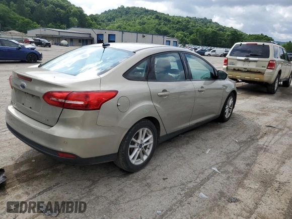 2015 Ford Focus SE z VIN 1FADP3F29FL312757, wystawiony jako Copart lot #61198315 z przebiegiem 84 944 mil mil oraz Szkoda całkowita • Salvage title. Historia ofert i sprzedaży dostępna na DreamBid. Obrazek 3.