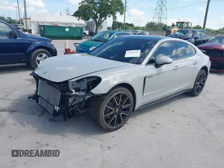 2018 Porsche Panamera 4 E-Hybrid z VIN WP0AE2A7XJL174378, wystawiony jako IAAI lot #42303125 z przebiegiem 35 636 mil mil oraz . Historia ofert i sprzedaży dostępna na DreamBid. Obrazek 19.