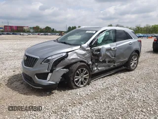 2023 Cadillac XT5 AWD Premium Luxury z VIN 1GYKNDRS0PZ157470, wystawiony jako Copart lot #55617655 z przebiegiem 48 986 mil mil oraz Szkoda całkowita • Salvage title. Historia ofert i sprzedaży dostępna na DreamBid. Obrazek 1.