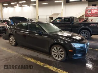2017 Audi A4 Premium with VIN WAUANAF41HN039147, listed as a IAAI auction lot 40893349 with 71,375 mi miles. Bid and sale history available at carsss.com. Image 1.