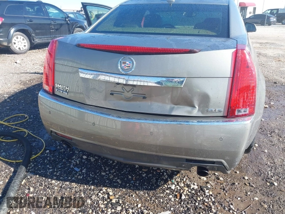 2011 Cadillac CTS Performance with VIN 1G6DK5ED6B0156490, listed as a IAAI auction lot 41346869 with 145,627 mi miles and . Bid and sale history available at DreamBid. Image 6.