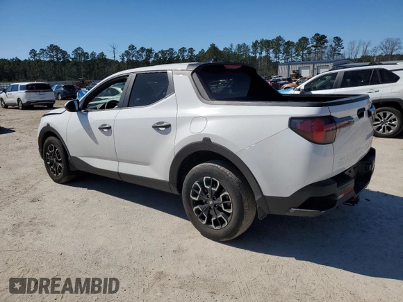 2022 Hyundai Santa Cruz SEL z VIN 5NTJBDAE5NH014097, wystawiony jako Copart lot #46309765 z przebiegiem 24 938 mil mil oraz Szkoda całkowita • Salvage title. Historia ofert i sprzedaży dostępna na DreamBid. Obrazek 2.