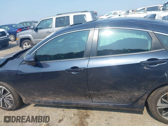 2016 Honda Civic EX-L with VIN 19XFC1F79GE003492, listed as a IAAI auction lot 42563306 with 166,420 mi miles and . Bid and sale history available at DreamBid. Image 14.