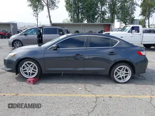 2016 Acura ILX Premium z VIN 19UDE2F76GA013196, wystawiony jako IAAI lot #42216841 z przebiegiem 73 867 mil mil oraz . Historia ofert i sprzedaży dostępna na DreamBid. Obrazek 14.