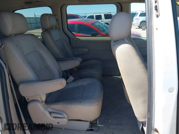 2004 Kia Sedona LX with VIN KNDUP131646596077, listed as a IAAI auction lot 41772025 with 236,282 mi miles. Bid and sale history available at carsss.com. Image 8.