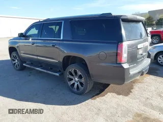 2015 GMC Yukon XL Denali with VIN 1GKS2JKJ9FR634771, listed as a IAAI auction lot 41676218 with 73,271 mi miles. Bid and sale history available at carsss.com. Image 3.